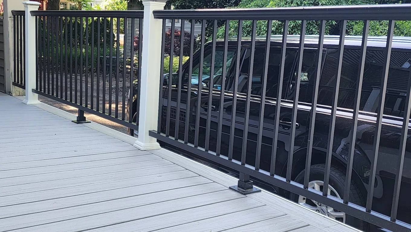 Composite deck boards and black railing