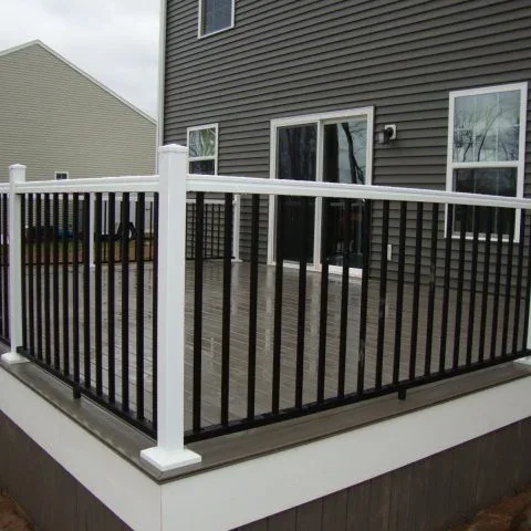 Composite deck with black metal railings
